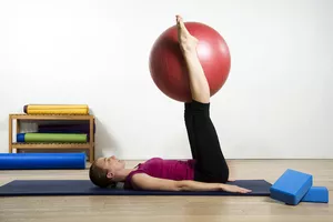 Woman Exercising Pilates