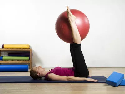 Woman Exercising Pilates