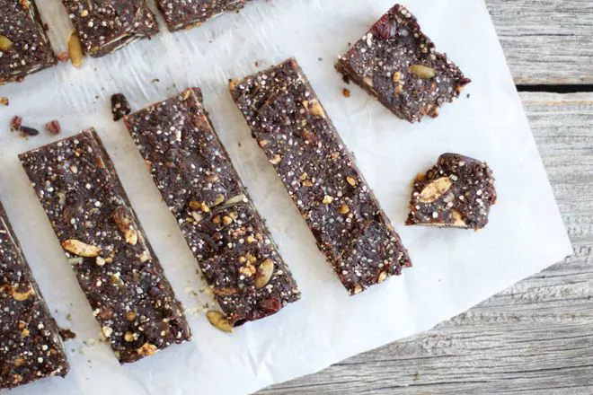 a bunch of cut protein superfood bars on a table.