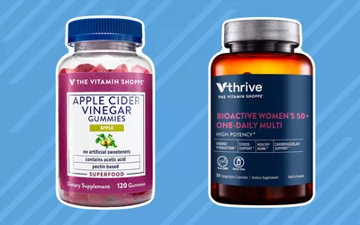 Vitamin bottles from the best places to buy vitamins on blue striped background