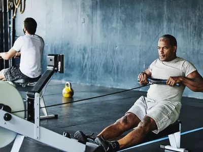 Man using a rowing machine