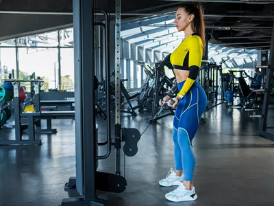 woman doing bicep cable curl