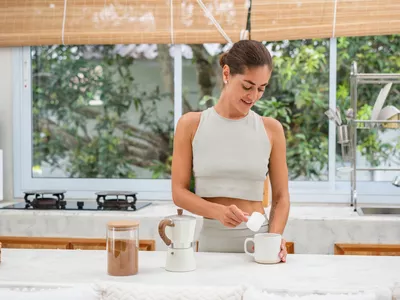 woman drinking protein powder