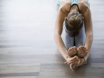 Woman touching toes