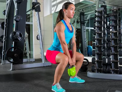 woman doing a goblet squat