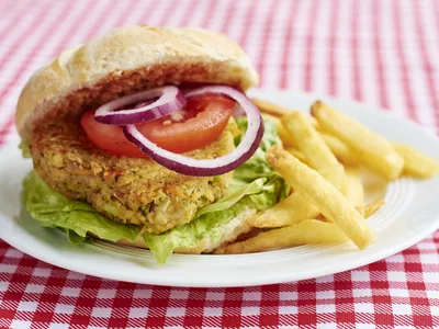 veggie burger and fries on a plate