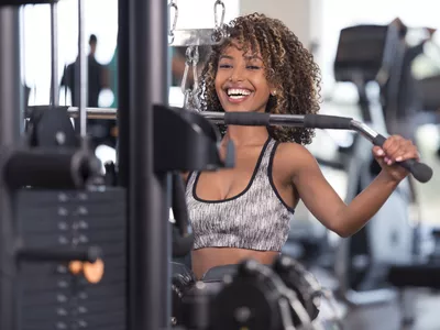 woman doing cable pull down