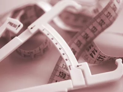 Body measuring tape with skin fold calipers