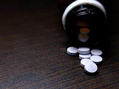 Many tablets in bottle.