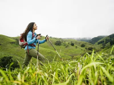 Women hiking with walking poles