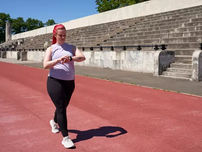 Woman walking on a track