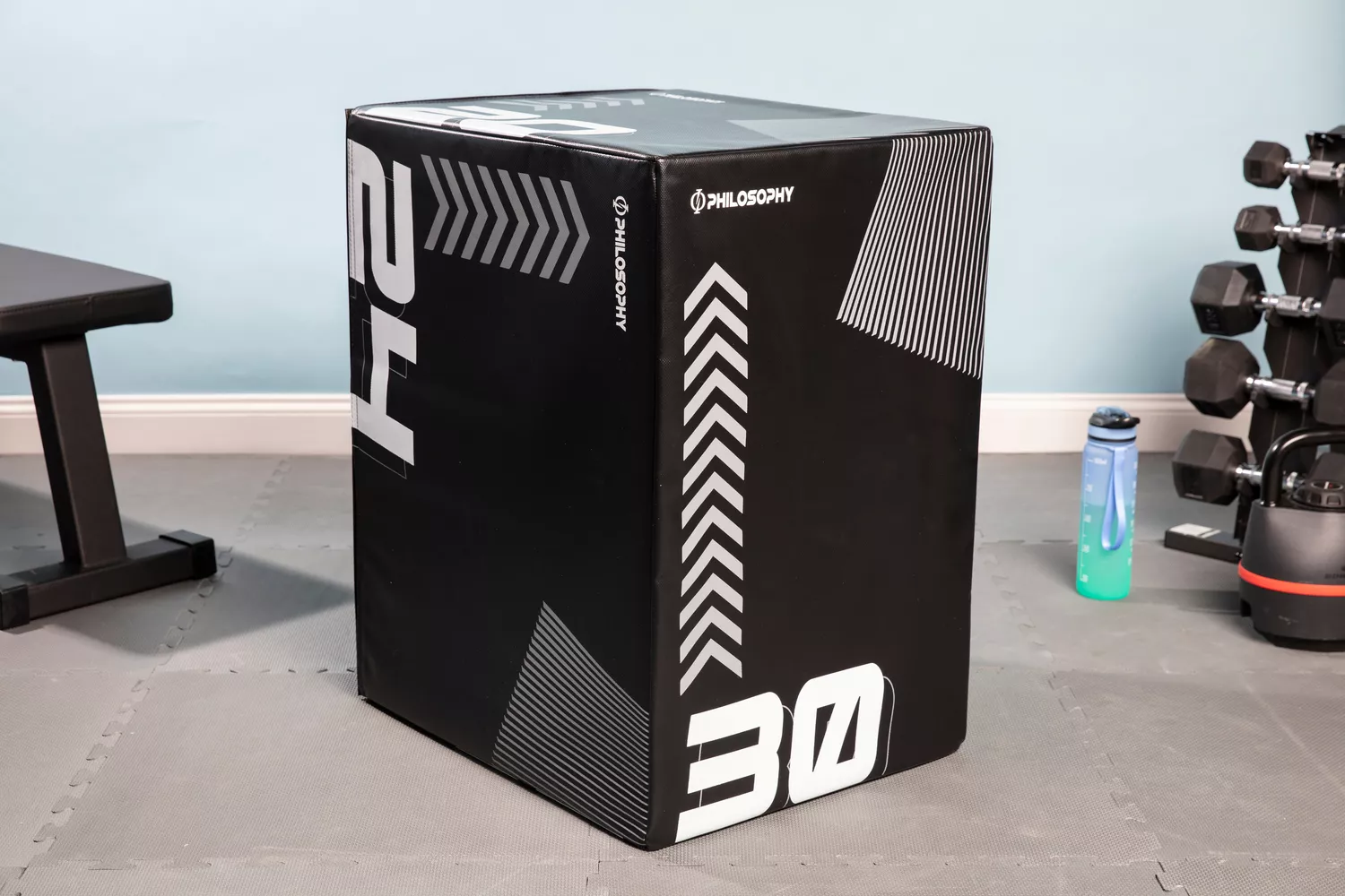 Philosophy Gym 3-in-1 Plyo Box on floor near fitness equipment