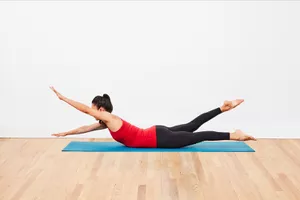woman doing swimming pose