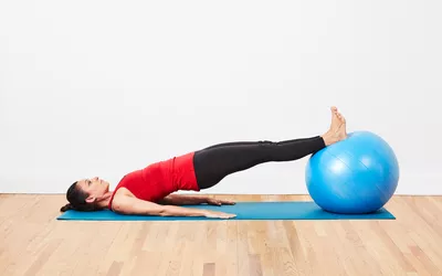 woman using exercise ball