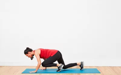 woman doing bear crawl