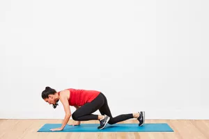 woman doing bear crawl