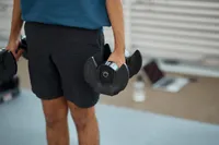 Person holding Core Home Fitness Twistlock Dumbells