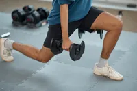 person working out with Core Home Fitness Twistlock Dumbells