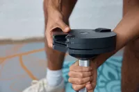 Hand adjusting Nuobell Adjustable Dumbbell weights