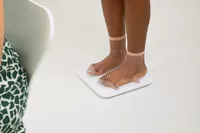 Person wearing mesh socks standing on Arboleaf Smart Scale CS20A