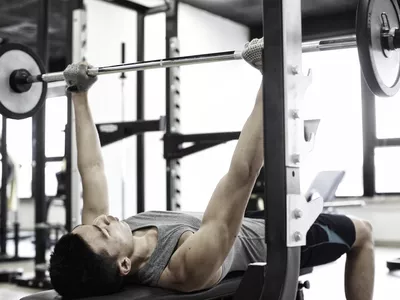 A man doing bench press