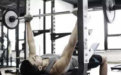 A man doing bench press