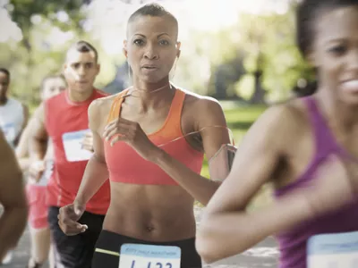Black athlete running in race