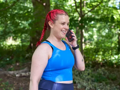 woman talking on phone with exercising