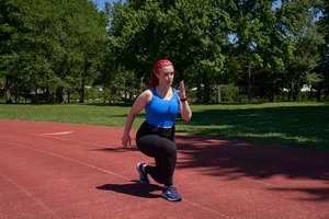 woman working out on a track