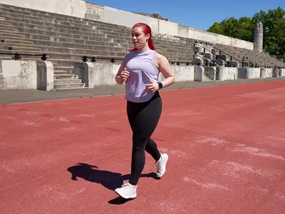 woman doing a fitness test on a track