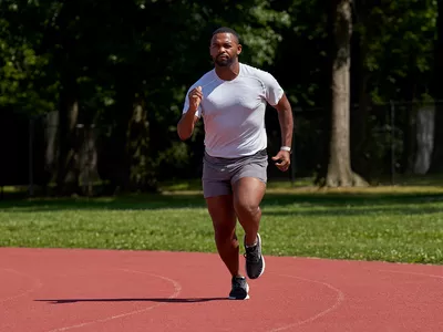 man running on a track