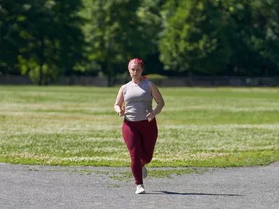 Woman running outside