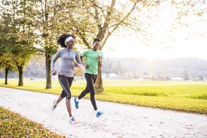 Friends running in the park