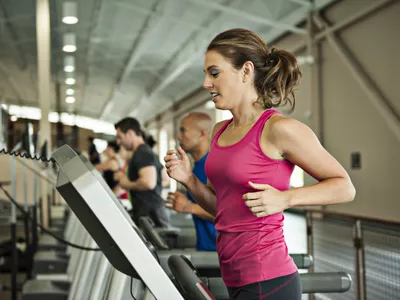 woman running on treadmill