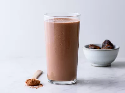 chocolate protein shake in a glass