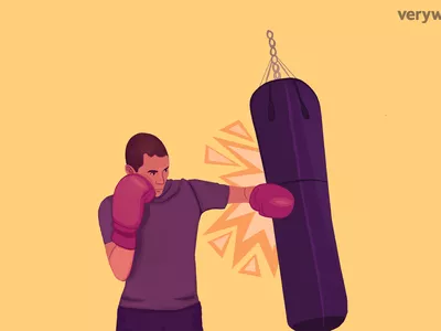 Man working out with a punching bag