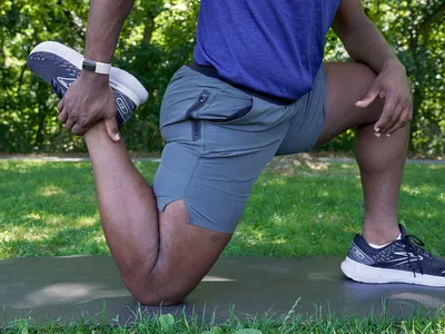 man doing stretches for quadriceps