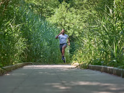 man working on running drills