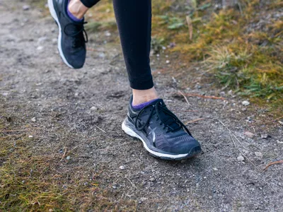 close up of walking sneaker on a trail