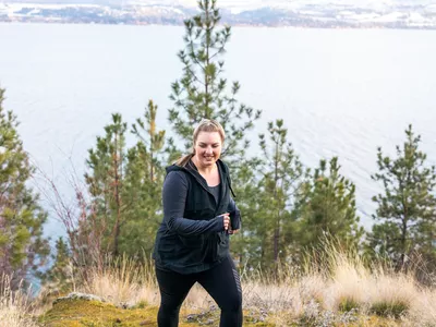 woman walking for fitness in the mountains