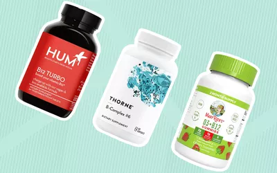 Assortment of B12 supplements we recommend for vegans and vegetarians displayed on a blue striped background