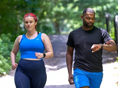 Woman and man walking outside