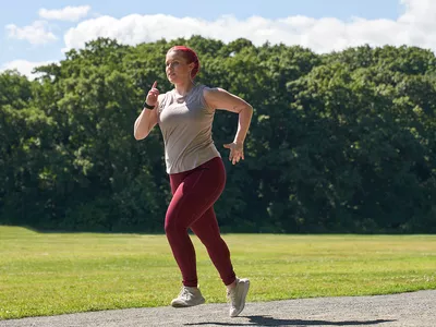 Woman running outside