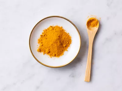 Turmeric powder on a small plate