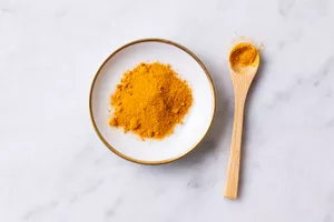 Turmeric powder on a small plate