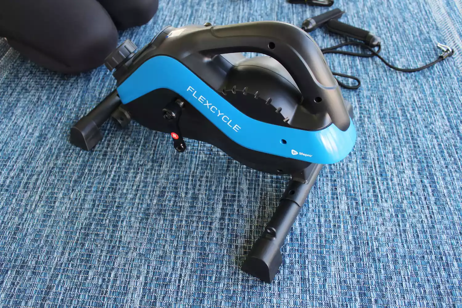 LifePro FlexCycle Exercise Bike Under Desk Bike Pedal Exerciser on mat