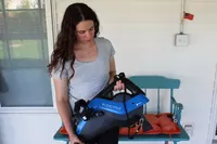 Person holding LifePro FlexCycle Exercise Bike Under Desk Bike Pedal Exerciser