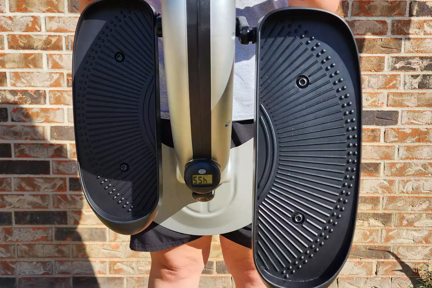 A closeup of the Stamina InMotion E1000 Compact Strider's foot pedals