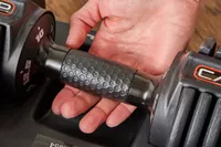 The pattern on the CAP Barbell 25 lb. Adjustable Dumbbell grips
