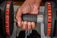 The handle on the Non Zero Gravity 55 lbs PowerDyne Adjustable Dumbbell